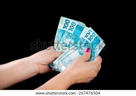 rich Woman Holding Money to pay someone