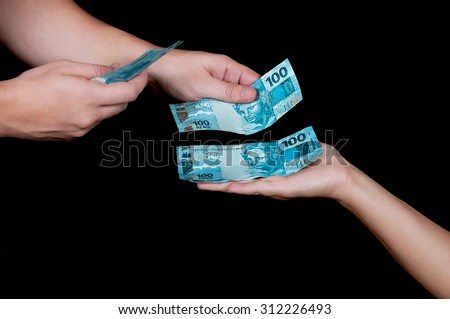 rich man paying someone with a lot of money