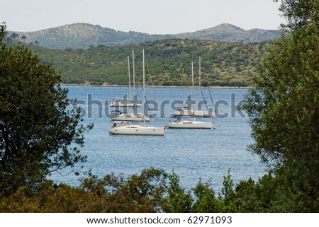 Group of sailing boats anchored in bay