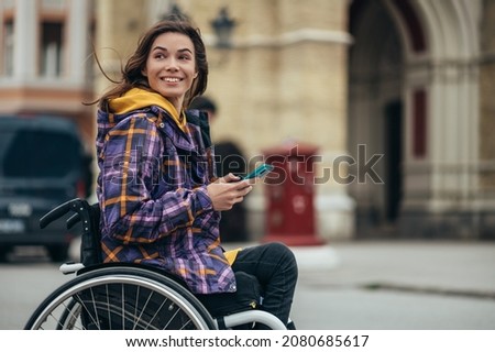 Similar – Image, Stock Photo Disabled young woman in kitchen with cat on her lap