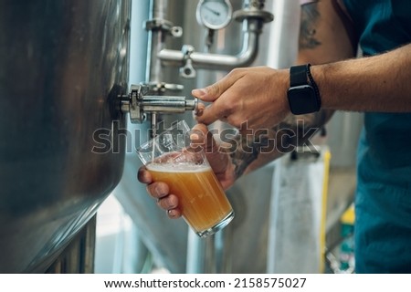 Similar – Foto Bild Mann füllt Glas mit Wein im Tal