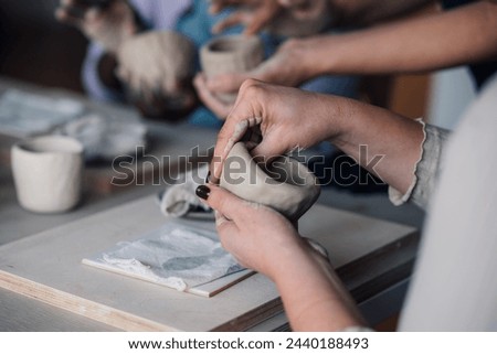 Similar – Image, Stock Photo Crop craftswoman making ceramic cup in workshop