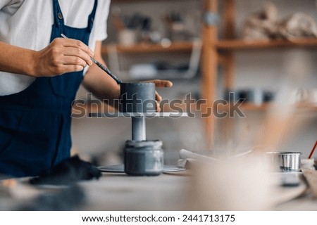 Similar – Image, Stock Photo Crop craftswoman making ceramic cup in workshop