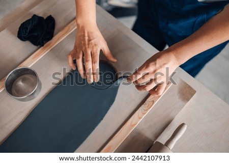 Similar – Image, Stock Photo Unrecognizable female ceramist making clay bowl in studio