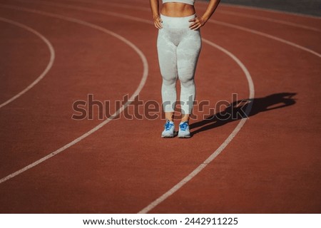 Similar – Image, Stock Photo Unrecognizable sportswoman exercising with elastic band at home