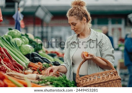 Similar – Image, Stock Photo Woman picking the vegetables in a garden