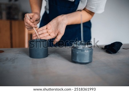 Similar – Image, Stock Photo Crop craftswoman making ceramic cup in workshop