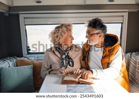 Similar – Image, Stock Photo read stories Wanderlust