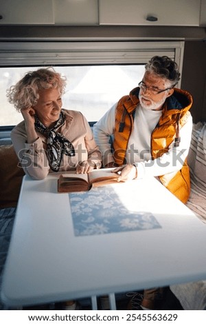 Similar – Image, Stock Photo read stories Wanderlust