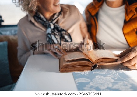 Similar – Image, Stock Photo read stories Wanderlust