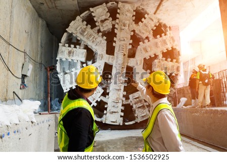 Similar – Image, Stock Photo Boringly colored concrete wall with a gap through which a bit of green creeps through.