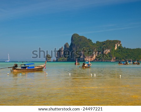 Traditional Thai longtail boats on a bay in Koh Phi-Phi Don, Thailand