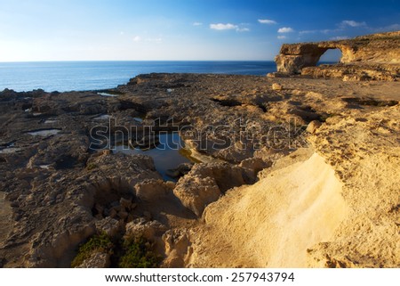 Natral limestone arch at the Maltese island Gozo