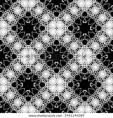 Design seamless decorative pattern. Abstract monochrome lacy background. Vector artv