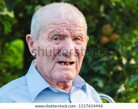 Similar – Image, Stock Photo Portrait of very old farmer with straw hat explaining life in front of a red tractor.