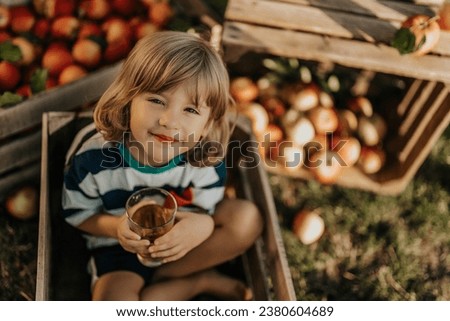 Similar – Foto Bild Kind trinkt Saft aus Strohhalm