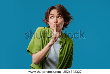 Similar – Image, Stock Photo Ethnic woman showing silence gesture in field
