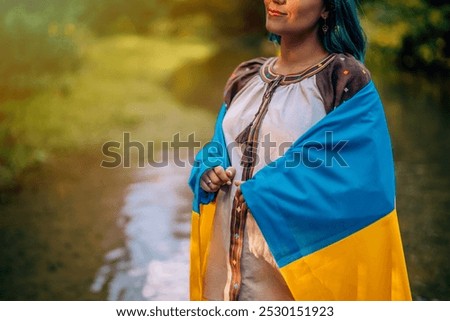 Similar – Foto Bild Lächelnde ukrainische Frau mit Nationalflagge auf Himmel Hintergrund. Porträt der jungen Dame in blauer Stickerei vyshyvanka. Kopieren Raum. Ukraine, Unabhängigkeit, Freiheit, patriotisches Symbol, Sieg im Krieg.