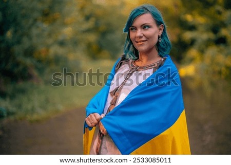 Similar – Image, Stock Photo Happy free ukrainian woman with national flag on dramatic sky background. Portrait of lady in blue embroidery vyshyvanka shirt. Ukraine, independence, patriot symbol