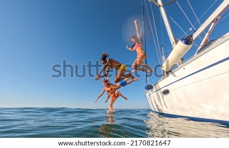 Similar – Image, Stock Photo young people diving in shallow seawater