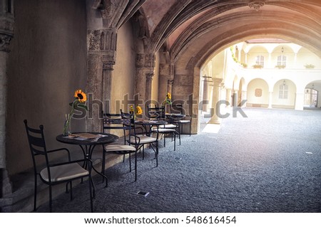 Similar – Image, Stock Photo Bistro street cafe chairs and tables parked in lockdown