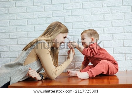 Similar – Image, Stock Photo Anonymous woman taking measurements in a wired dummy