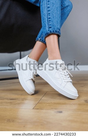 Image, Stock Photo Black pants, sneakers, legs stand with shadow on pavement