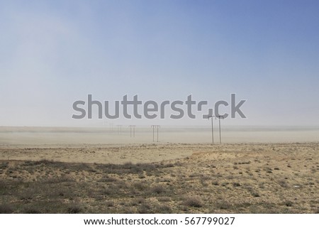 Emty prery with utility pole in spring desert of Kazakhstan Zdjęcia stock © 