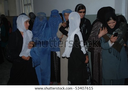 BAHARAK, AFGHANISTAN - AUGUST 12: Afghan school girls, from Baharak, Badakhshan, in school corridor August 12, 2009 in Baharak, northern Afghanistan. Waiting for class to commence.