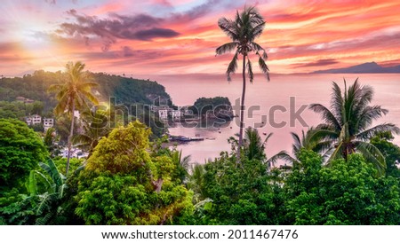High angle view of the popular dive resort of Sabang Beach in Puerto Galera, Oriental Mindoro, Philippines, with a beautiful pink sunset sky creating an idyllic tropical island scene. Zdjęcia stock © 