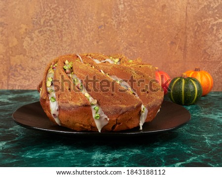 Similar – Image, Stock Photo Chopped pumpkin drizzled with oil for baking