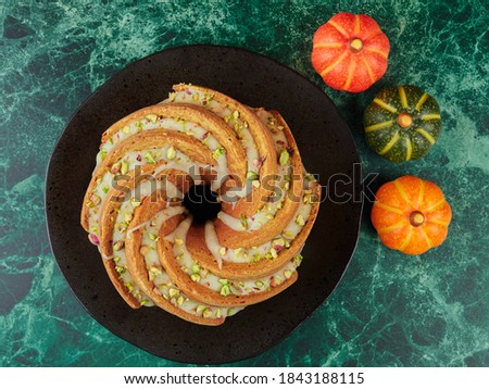 Similar – Image, Stock Photo Chopped pumpkin drizzled with oil for baking