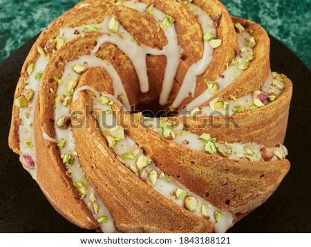 Similar – Image, Stock Photo Chopped pumpkin drizzled with oil for baking