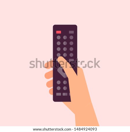 Hand holding remote controller flat vector icon