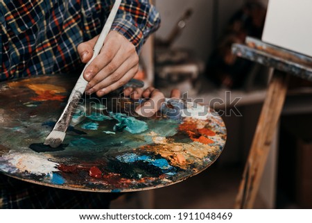 Similar – Image, Stock Photo Artist studio / paint pot and squeegee