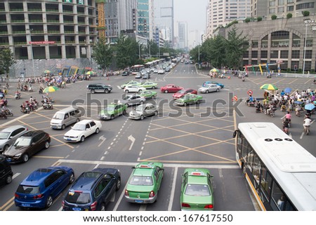 Chengdu, Sichuan, China - August 24, 2013 - The view of major street of the city, there traffic problem is very serious