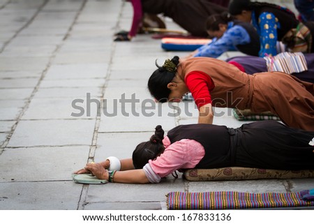 Lhasa, Tibet, China - August 29, 2013 : there are many believers are paying respects to the Jokhang Temple  from everwhere in Tibet.