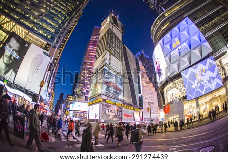 NEW YORK CITY - Jan 22: The Times Square at night on Jan 22, 2015 in New York, Times Square is major commercial intersection in New york and one of the most visited tourist attractions in the world.