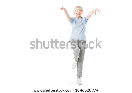 Similar – Image, Stock Photo Senior woman in sportswear jogging through the forest