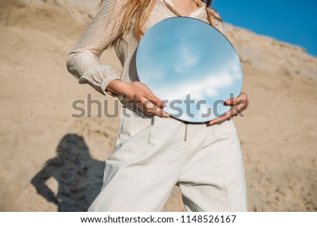 Similar – Image, Stock Photo Crop woman on sandy beach during vacation