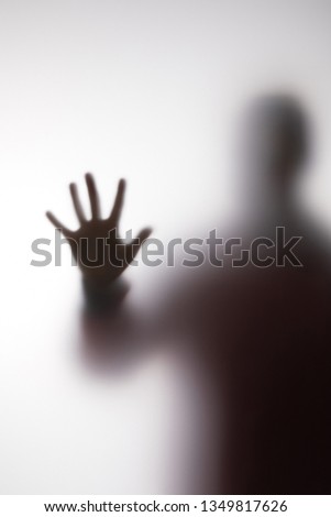 Similar – Image, Stock Photo Anonymous person touching glass of window