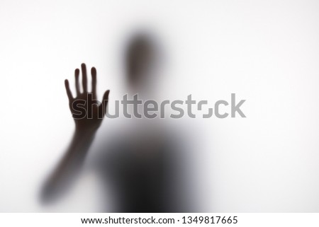 Image, Stock Photo Anonymous person touching glass of window