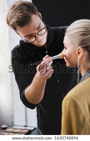 Similar – Image, Stock Photo Crop woman doing makeup in studio