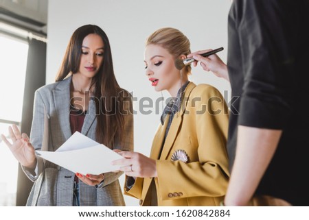 Similar – Image, Stock Photo Crop woman doing makeup in studio