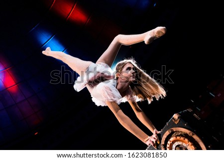 Similar – Image, Stock Photo Woman performing handstand while practicing yoga on street