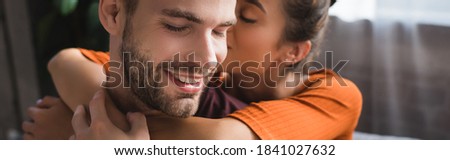 Similar – Image, Stock Photo Happy couple embracing gently in nature