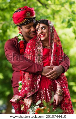 Similar – Image, Stock Photo Pleased woman in turban resting in hammock on terrace