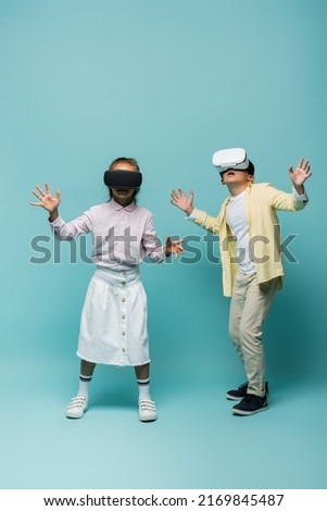 Similar – Image, Stock Photo Child in VR headset playing on couch