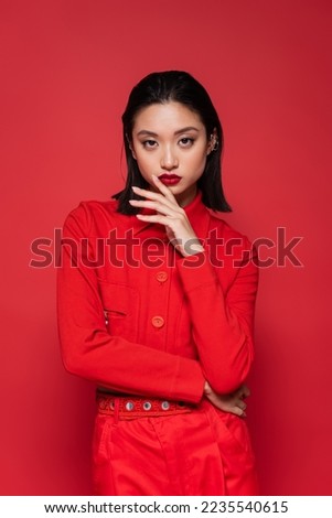 Image, Stock Photo Asian woman, posing near a tobacco drying shed, wearing a white dress and green wellies.