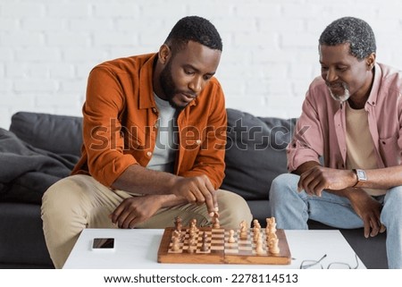 Similar – Image, Stock Photo Man plays chess